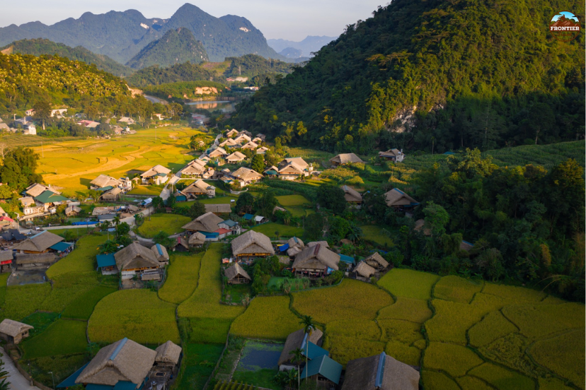 Rural road crossing rice fields along the northeast Vietnam route